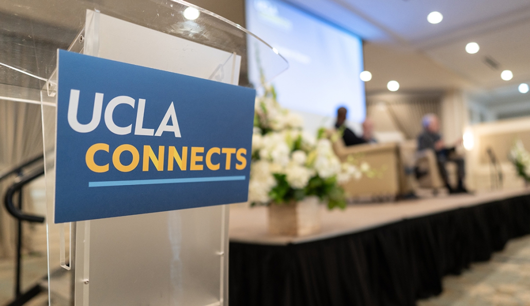 Close up of a podium sign that says UCLA Connects.